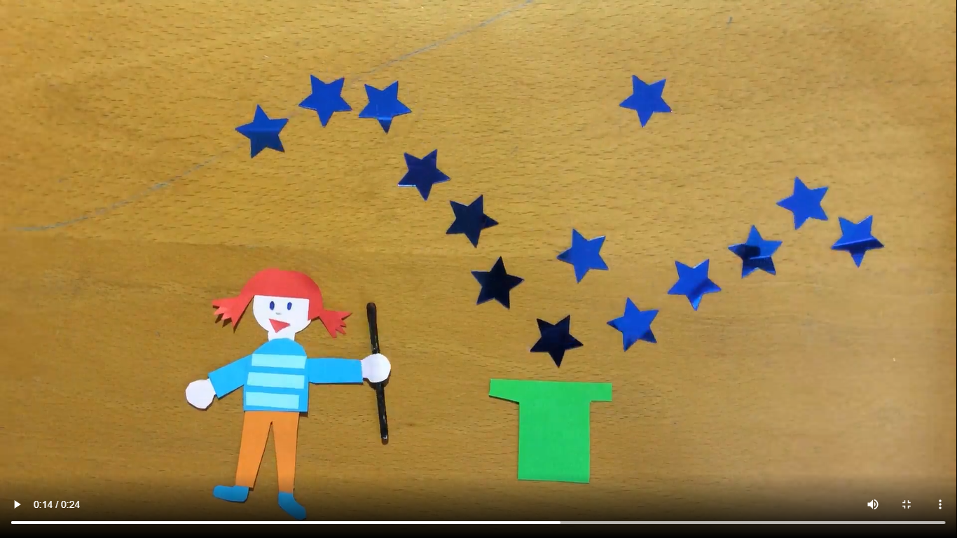 Screenshot aus einem Legetrick-Film: Ein Mädchen zaubert Sterne aus einem Zylinder.